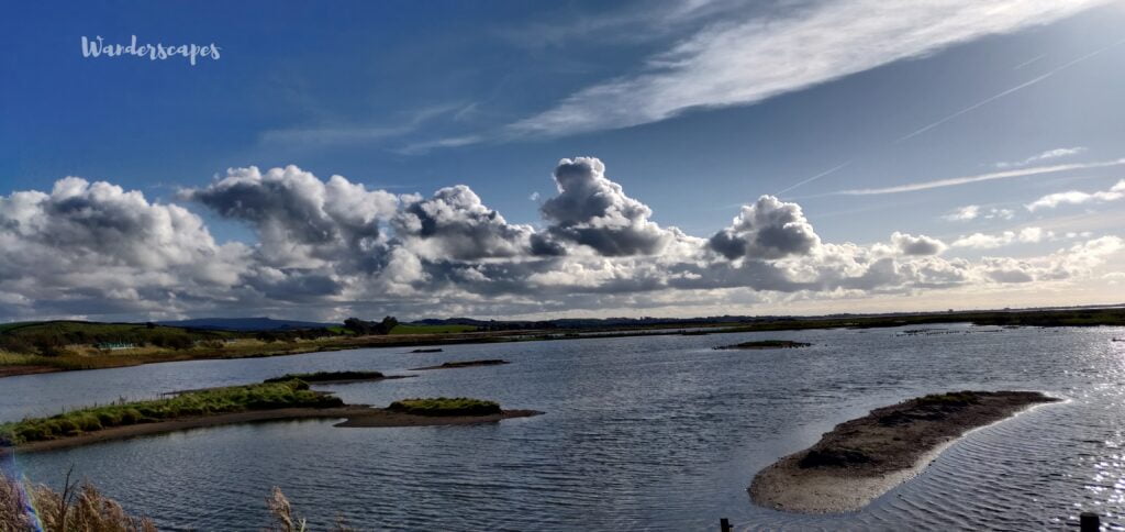 Beautiful Sunny day with clouds hanging